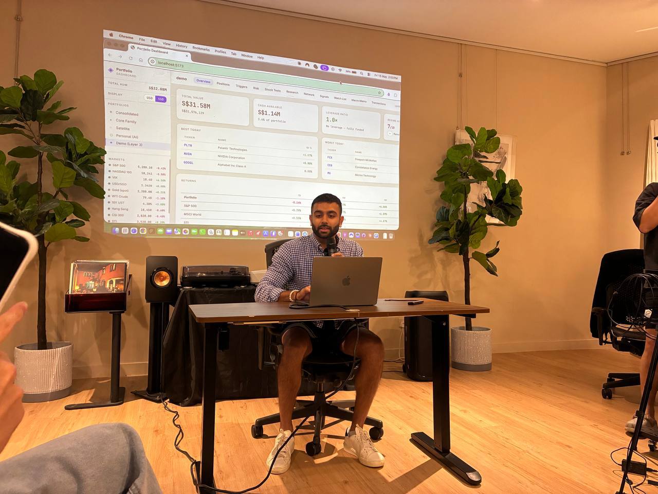 An instructor walking the room through a live demo
